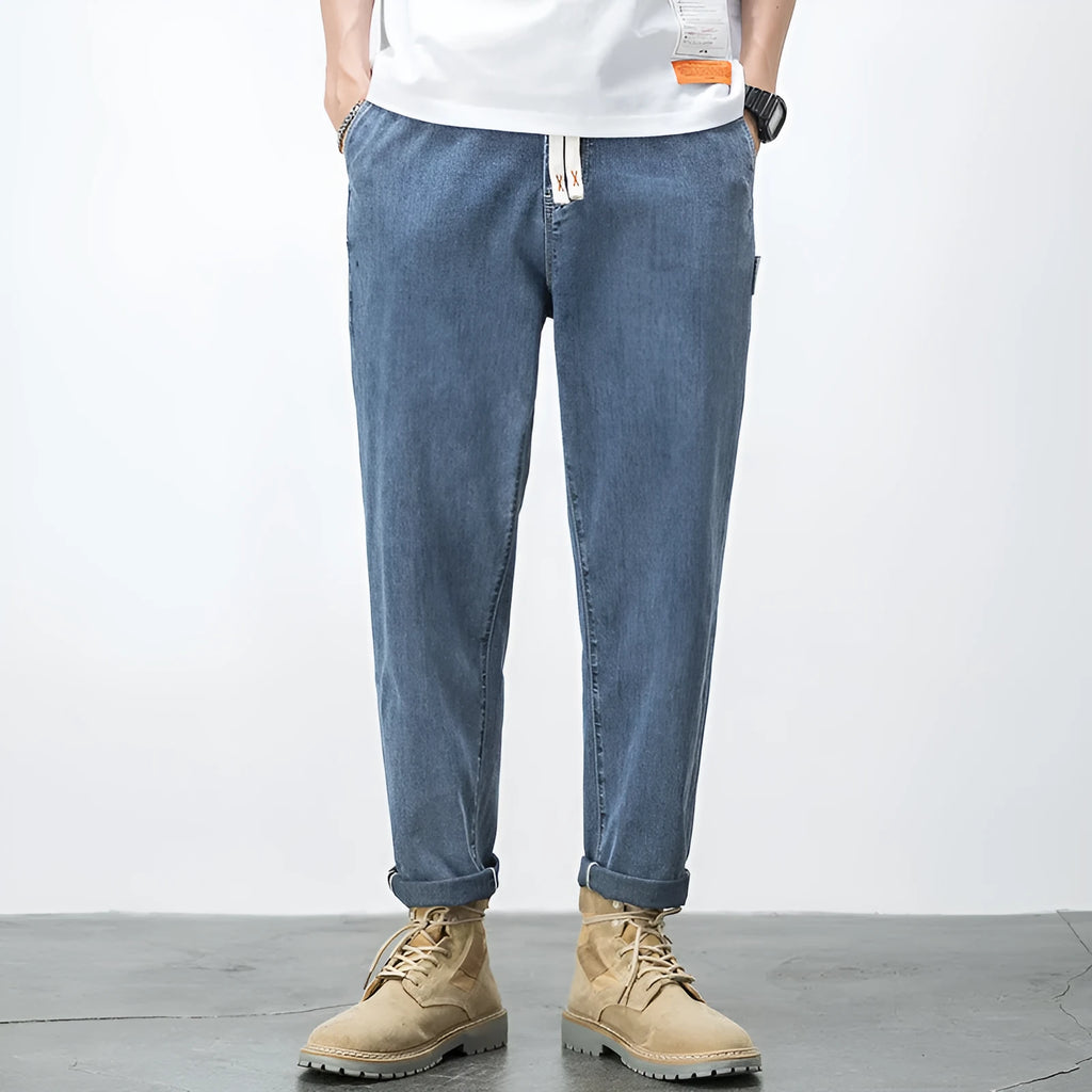 Men's loose plus size elastic waist straight leg jeans in blue denim