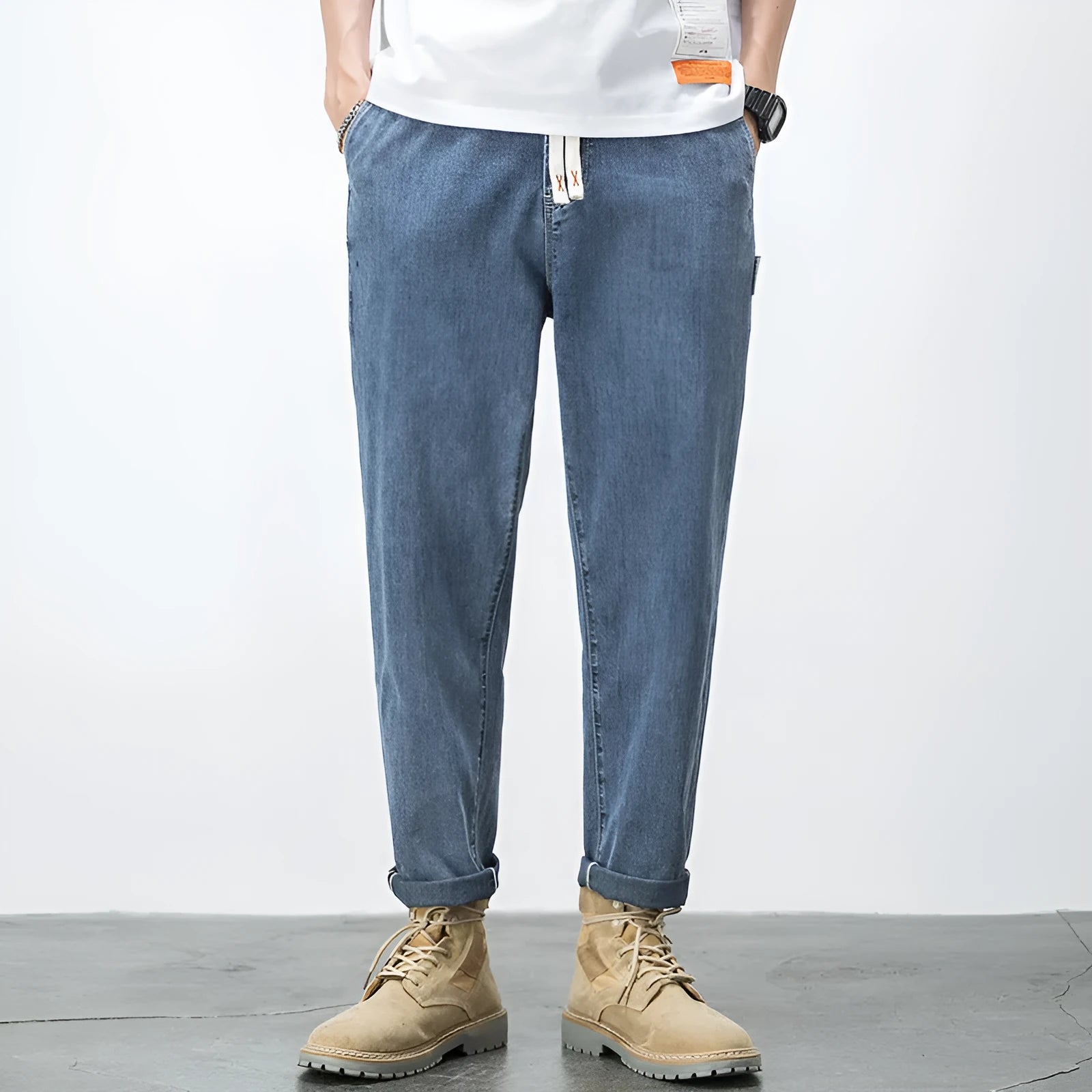 Men's loose plus size elastic waist straight leg jeans in blue denim