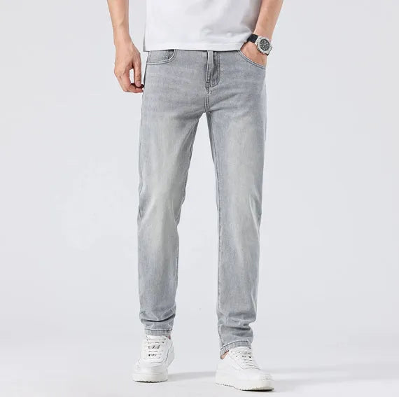 Men's light wash slim straight leg jeans in light grey cotton with no-iron finish
