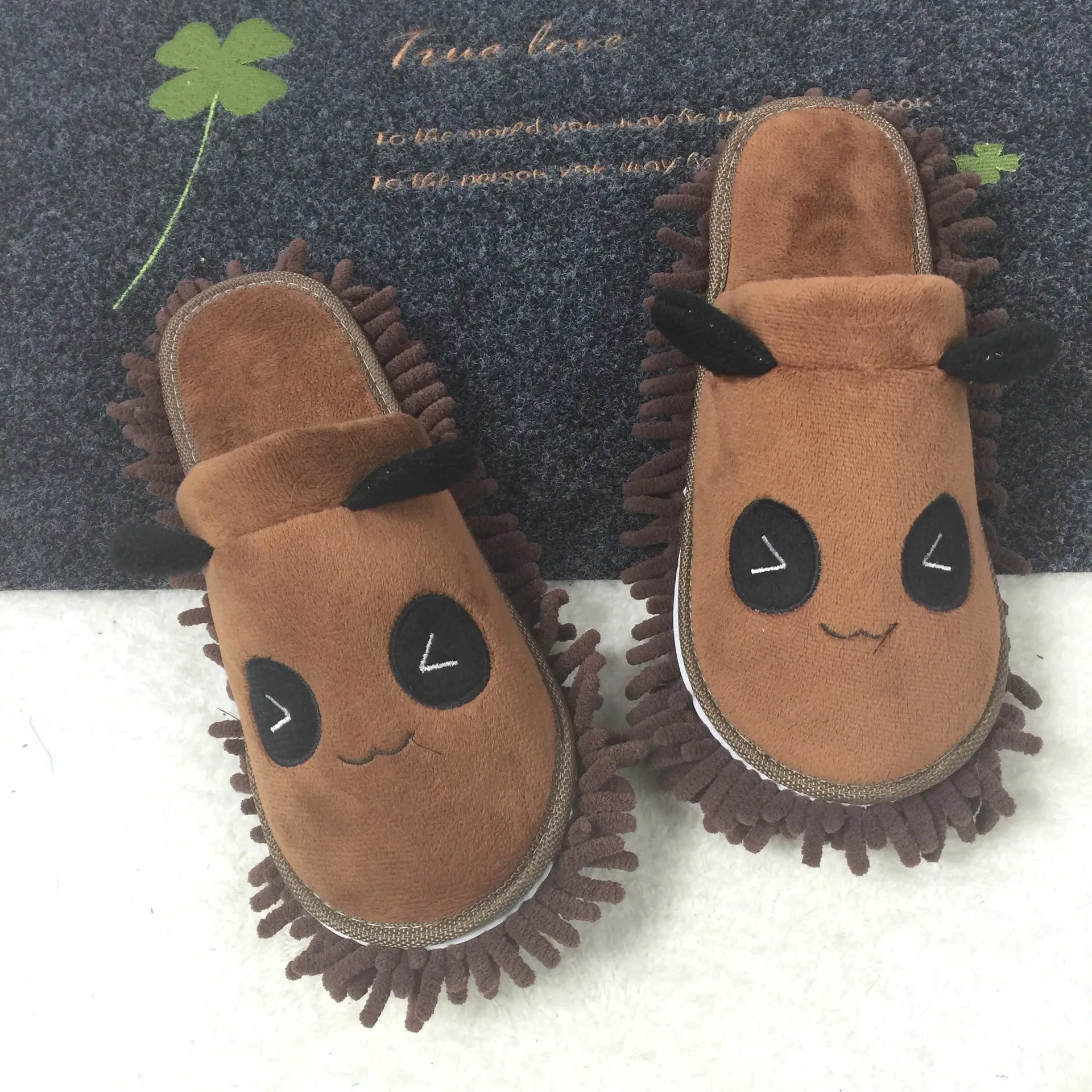 Panda-themed removable slippers in coral fleece with chenille sole