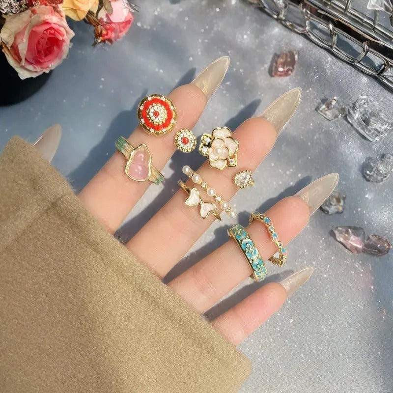 Close-up of a copper adjustable gourd ring with vintage oil-dripping finish and inlaid zircon stone.