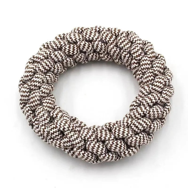 Natural cotton braided ring dog chew toy showing woven knot texture