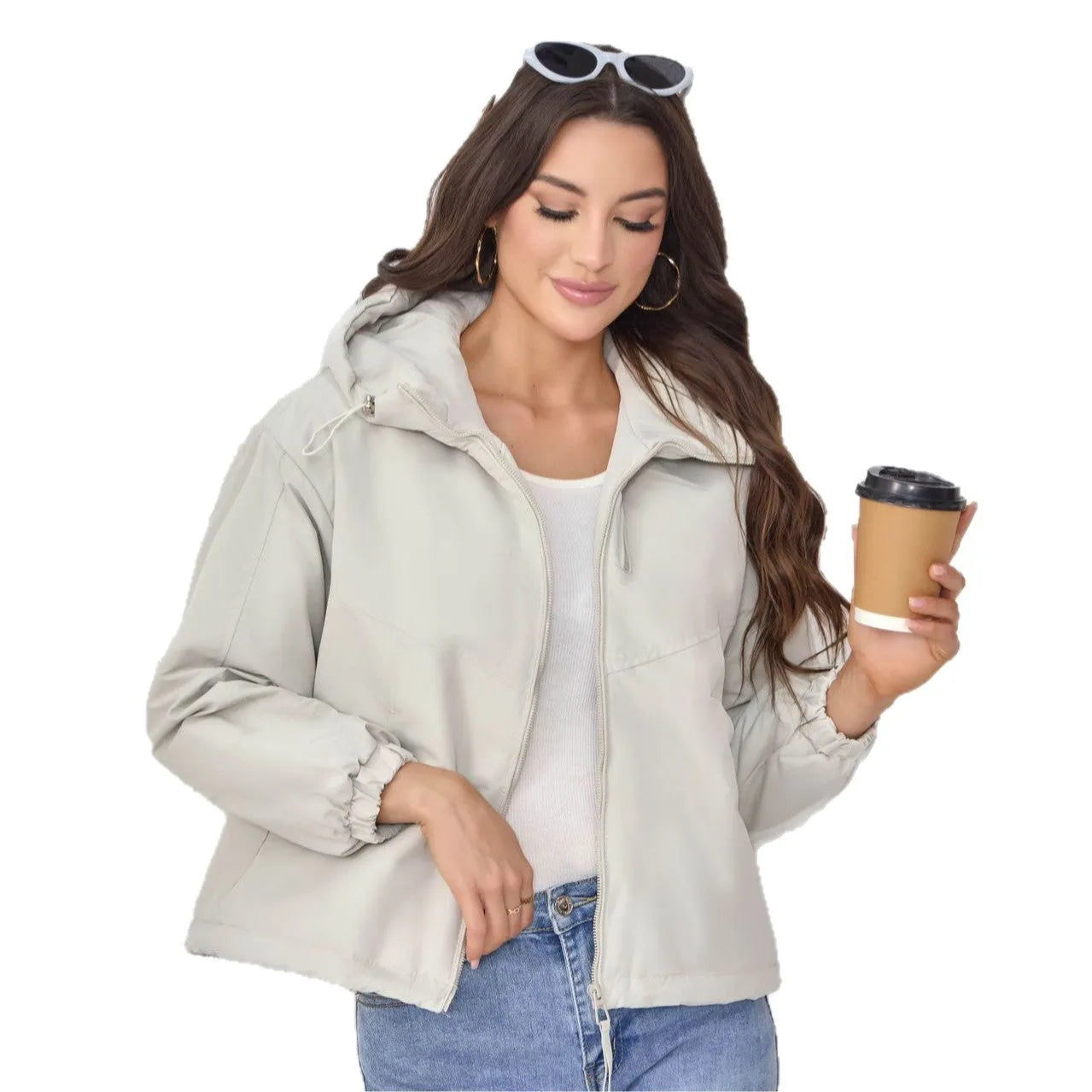 Women's grey loose-fit hooded polyester jacket with full zip and long sleeves.