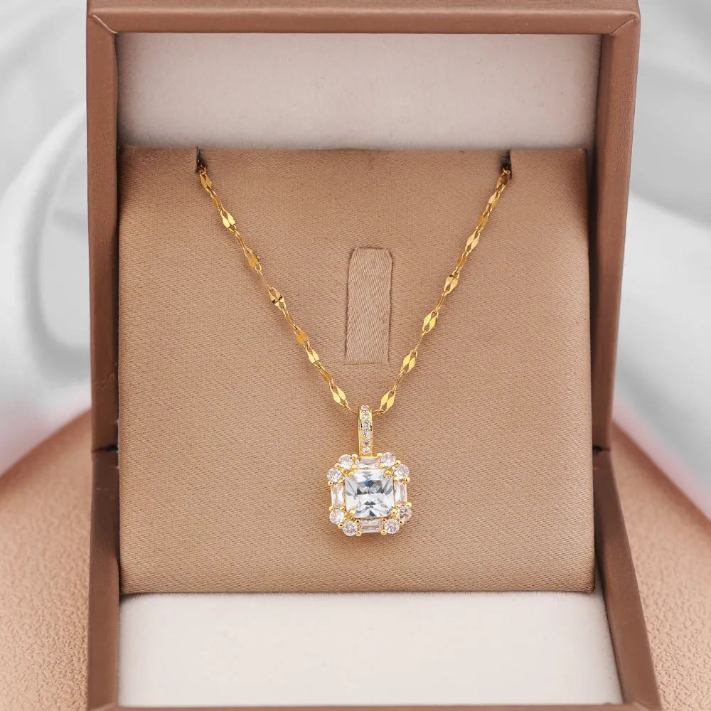 Geometric quadrilateral pendant necklace with mixed gem inlay on a gold titanium steel chain.