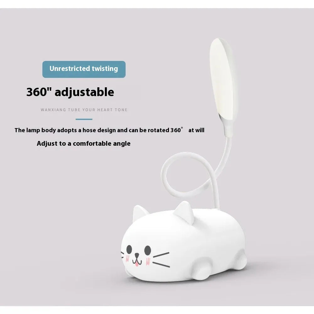 LED cartoon cat desk lamp in pink with USB rechargeable battery and ABS body on a desk