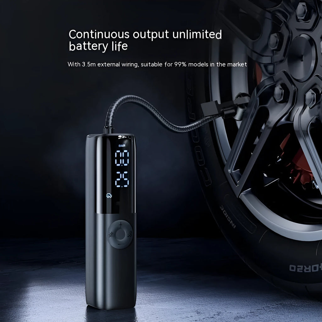 Black portable car tyre inflator with pressure gauge and plug connection