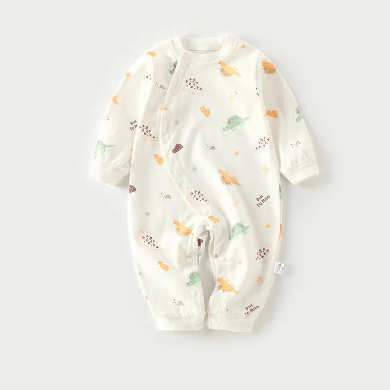 Cotton baby long climb pajamas in a colourful print, shown laid flat, suitable for spring and autumn.