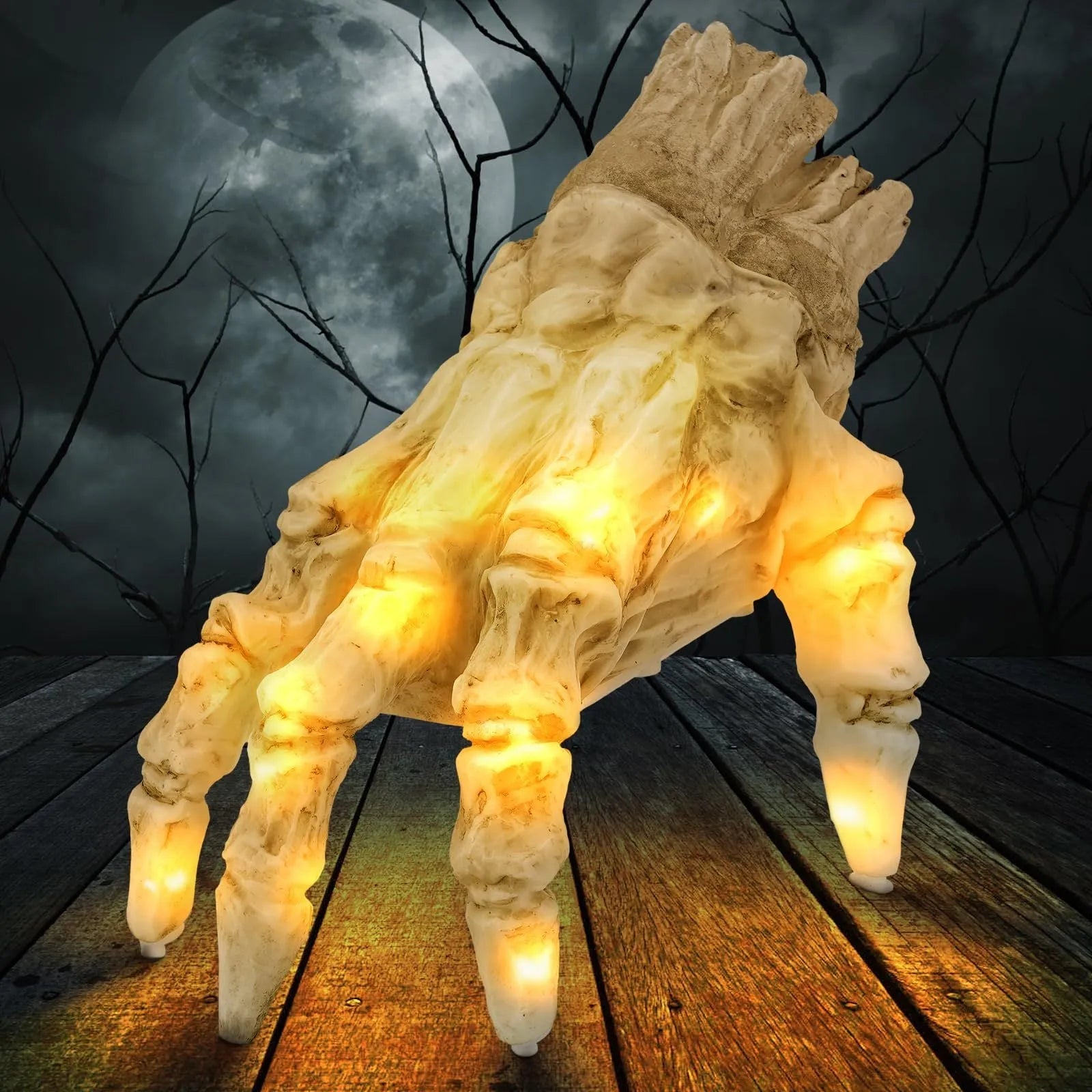 Halloween electric luminous crawling hand made of realistic vinyl with glowing lights on a floor