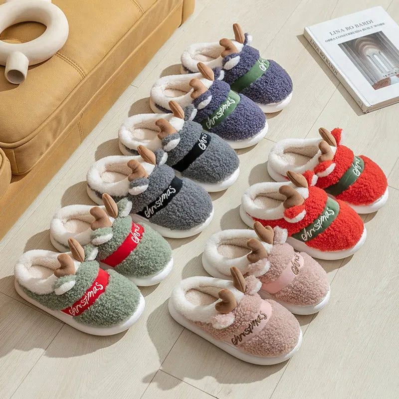 Christmas elk winter home slippers in pink with suede upper and thickened EVA sole on a cream background