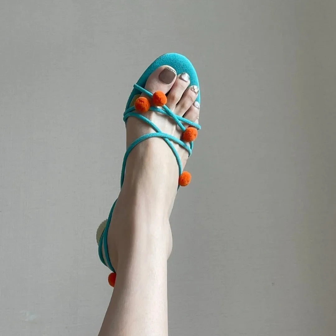 Cyan genuine leather women's sandals with lace-up straps, open toe, and a niche ball high heel.