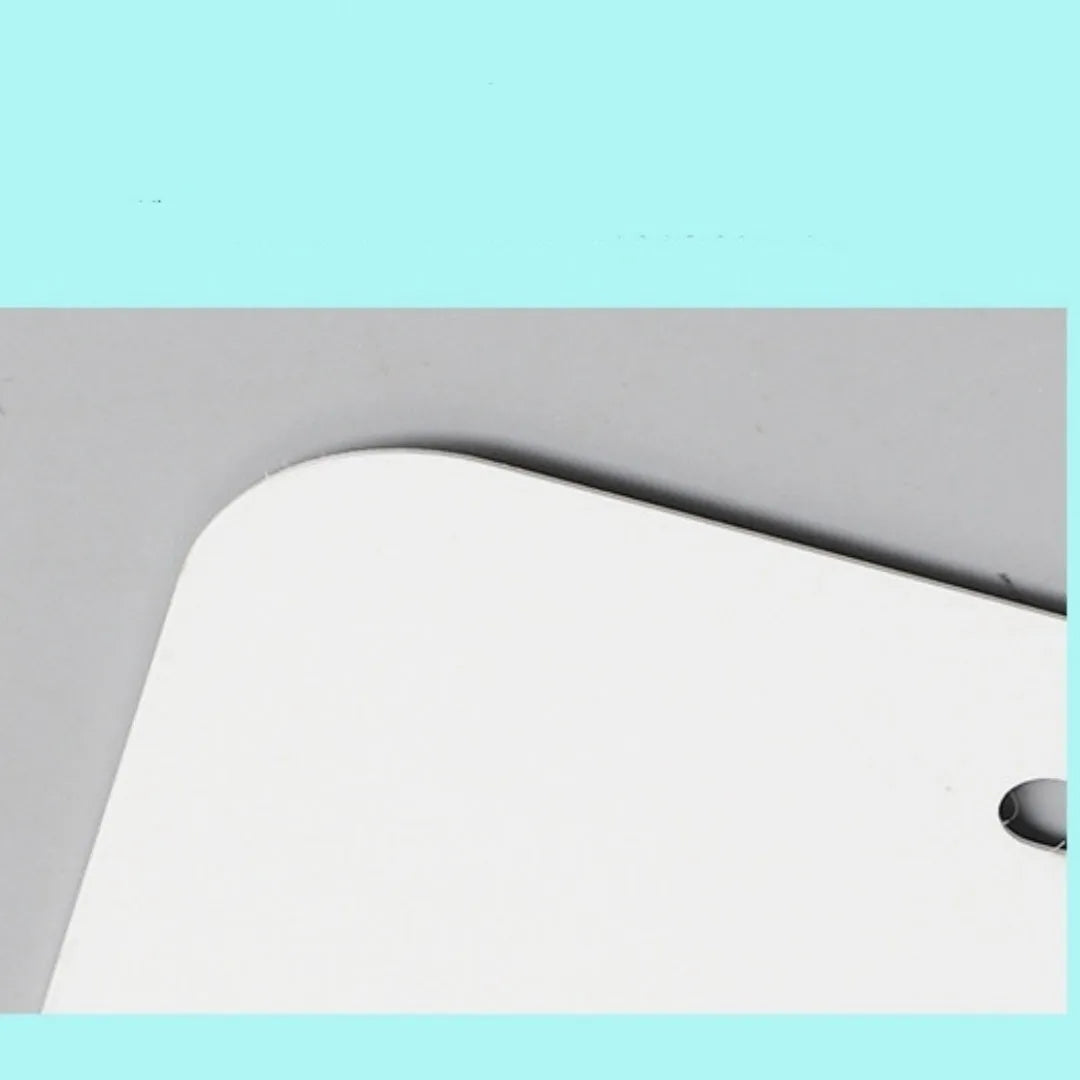 White aluminium car number plate blank measuring 30.3 by 15 centimetres.