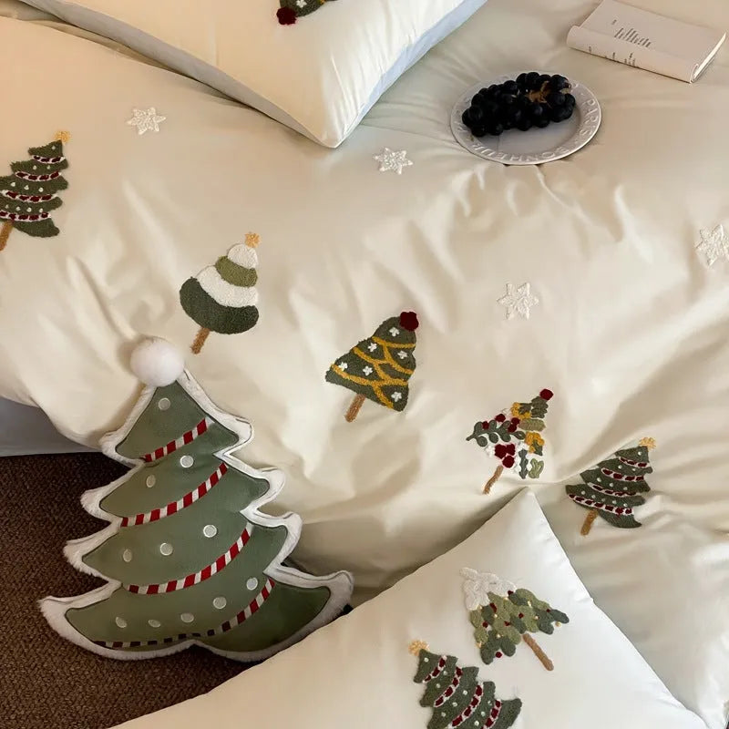Cream Blue pure cotton duvet cover with raised towel embroidery of a Christmas tree and flowers, part of a four-piece bedding set.