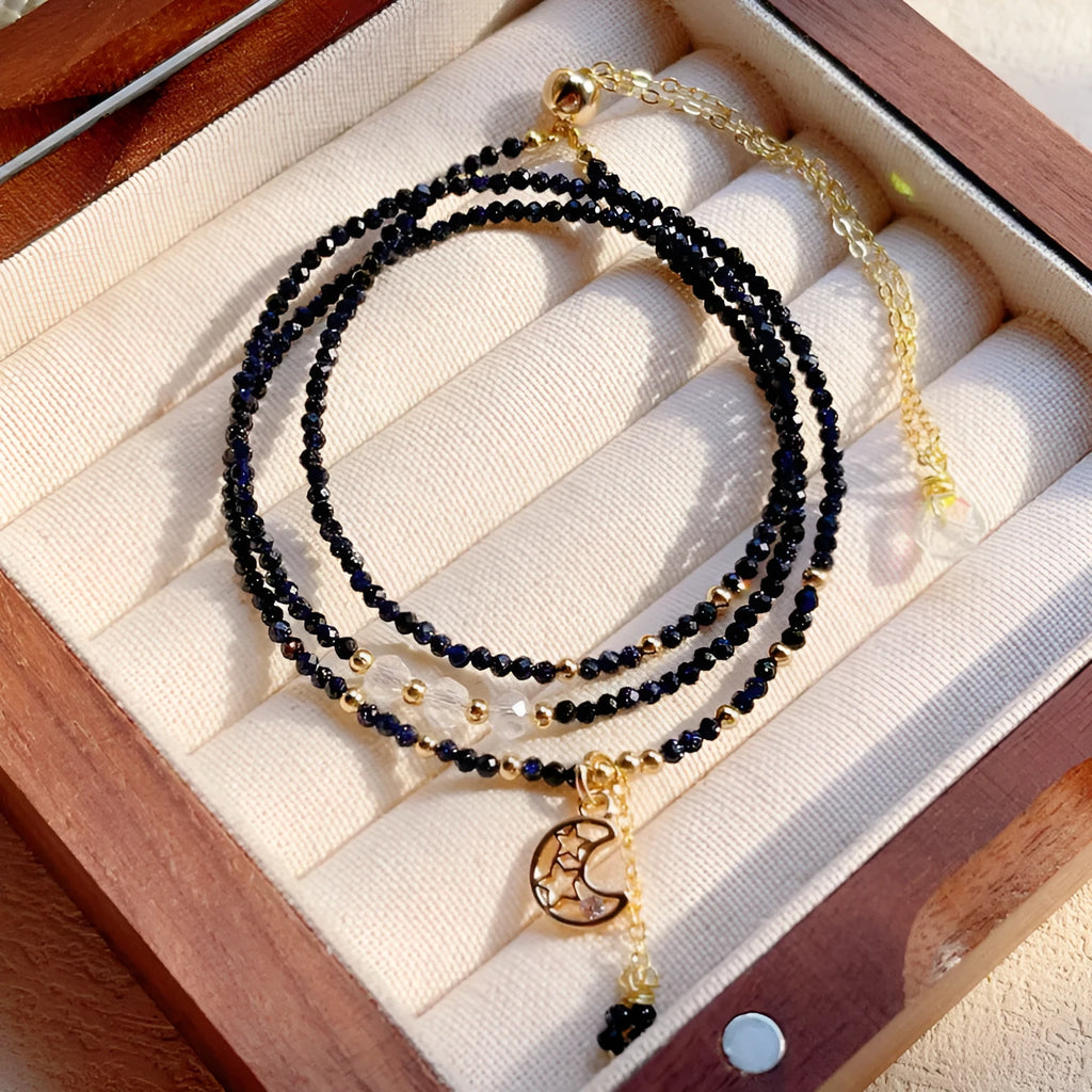 Women's blue sand stone bracelet with three gold-coloured rings in multi-layer design