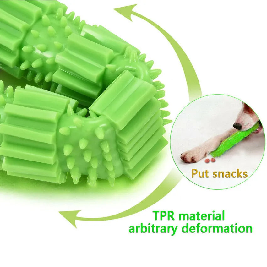 Green natural rubber dog chew toy with textured surface and hollow centre for treats.