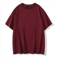 Men's loose fit cotton t-shirt with round neck and drop shoulder sleeves in solid rust red colour