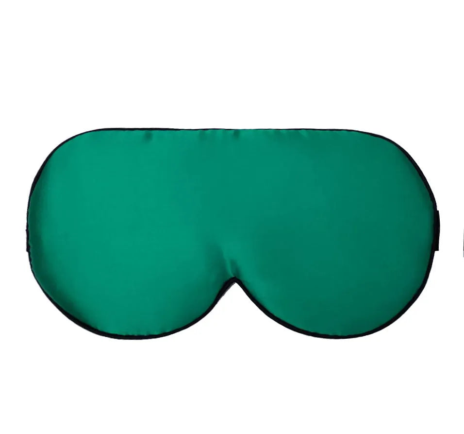Double-sided mulberry silk sleep mask with embroidered print in various colours.