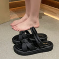 Women's black and white soft back outdoor sandals with flower detail and PVC sole