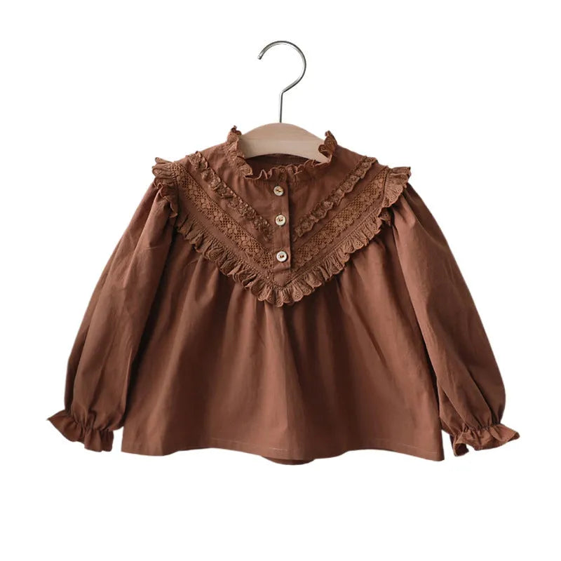Cotton girls princess shirt with lace collar and long puff sleeves in beige on white background