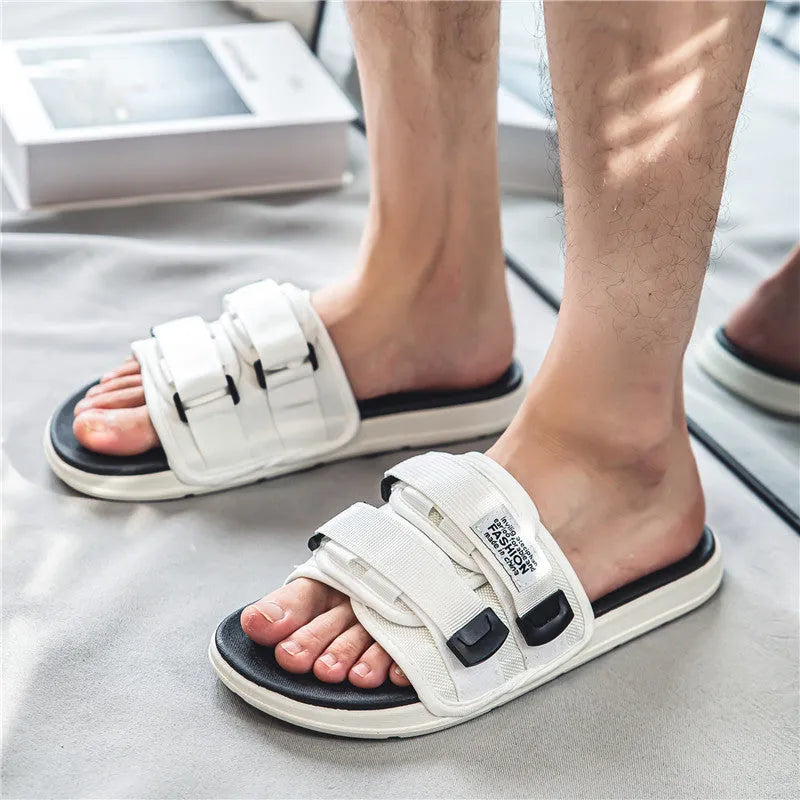 Men's canvas sports sandals with hook-and-loop closure in black and white, available in six sizes from UK 35-36 to 45-46.