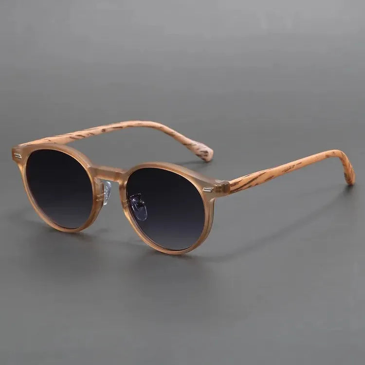 Retro frosted round rim sunglasses with UV-protection lenses in leopard print frame.