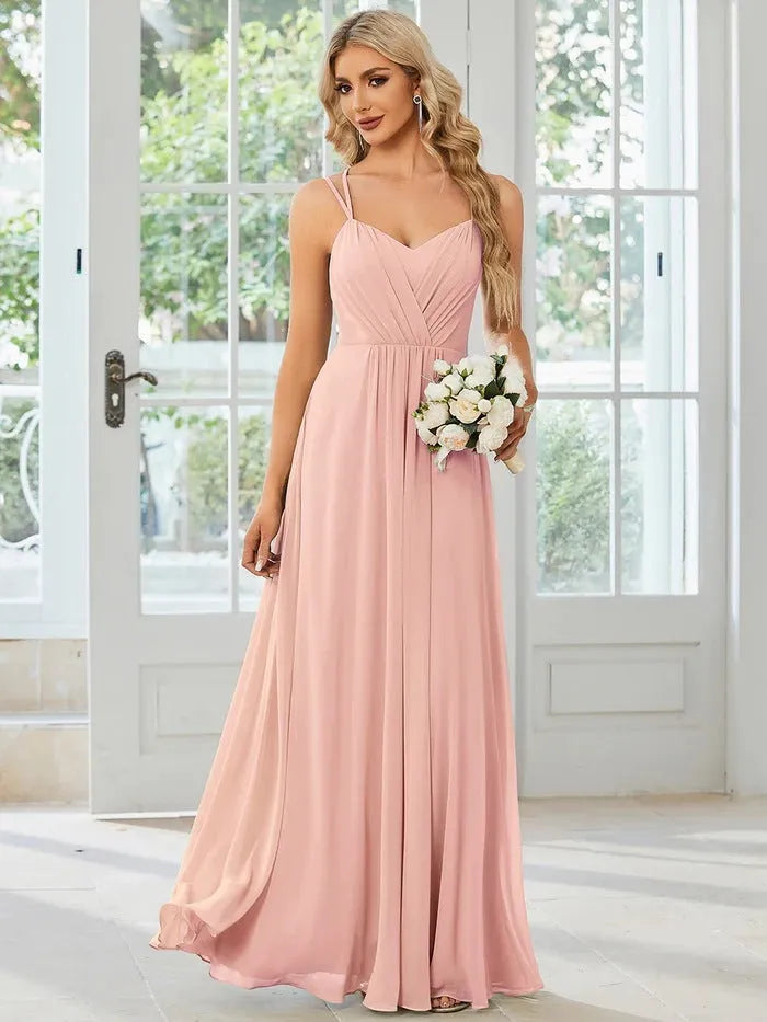 Women's sleeveless A-line maxi dress with long pleating detail in solid colour