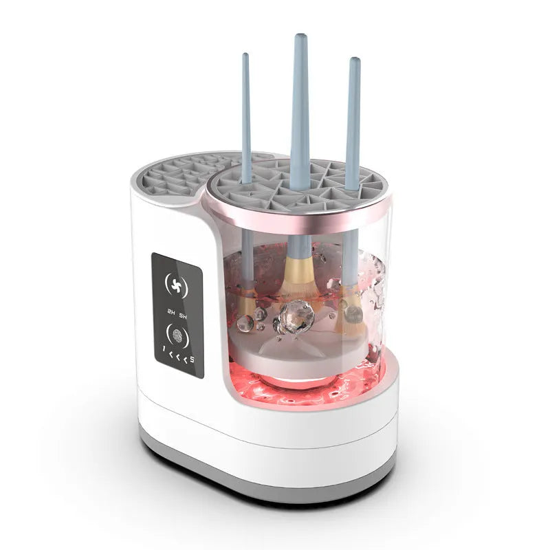 Automatic electric makeup brush cleaning device with drying chamber showing brushes in silicone cleaning bowl