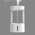 White portable humidifier with anti-gravity water droplet illusion and 580ml transparent tank