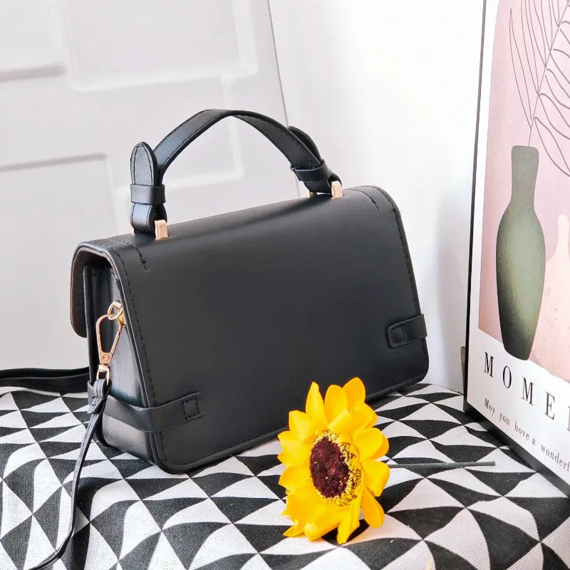 Small square retro crossbody bag with floral and rhombus pattern in a choice of colours.