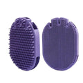 Purple dual-sided pet shampoo massage brush with soft TPR bristles and ergonomic handle