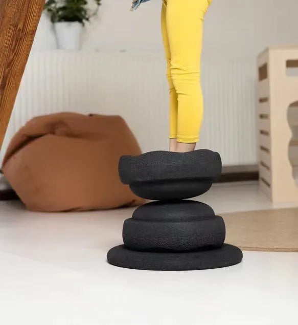 Plastic wood surf balance board for children in mixed colour or black finish.