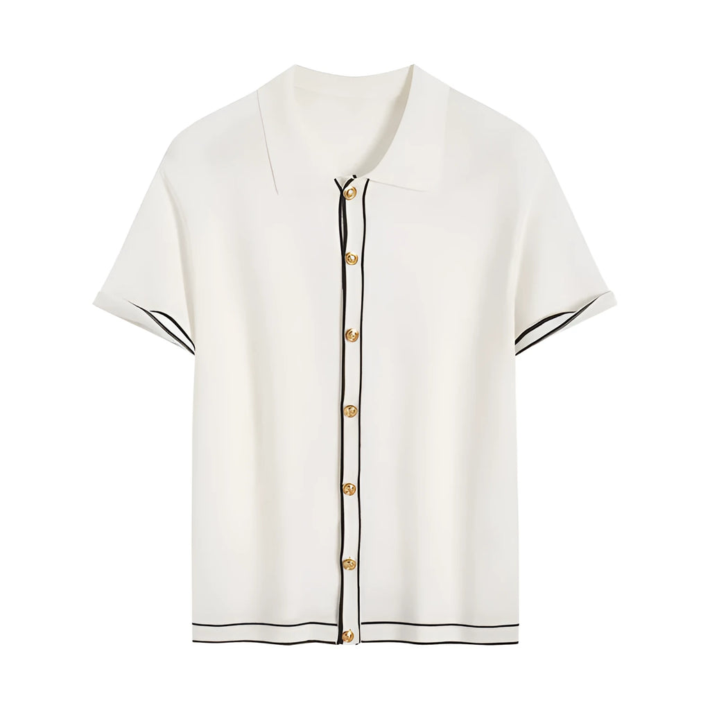 White short-sleeve cardigan with dark contrast lapels, shown on a model, old money style.