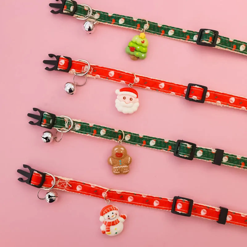 Christmas pet collar with bow tie, bell, and adjustable strap featuring Santa Claus and tree patterns