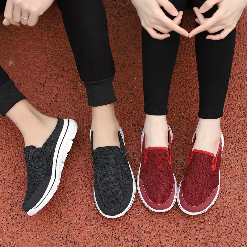 Breathable mesh toe holder slippers in solid colours on a flat heel sole.
