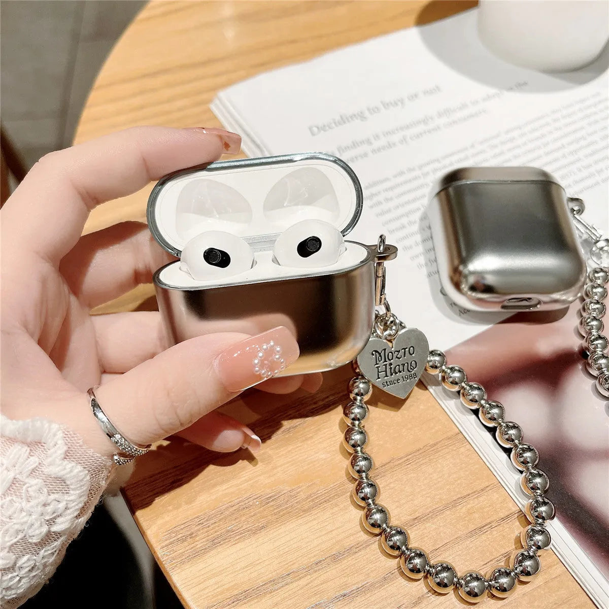 Matte plating protective case for Apple AirPods showing TPU material and electroplating finish.