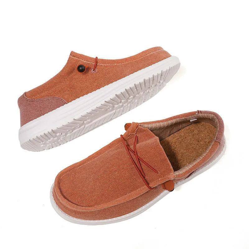 Men's orange and green canvas casual shoes with colourful splicing detail and rubber soles