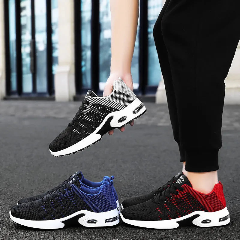Men's low-top Flyknit mesh sneakers in black with coloured accents on an injection moulded sole