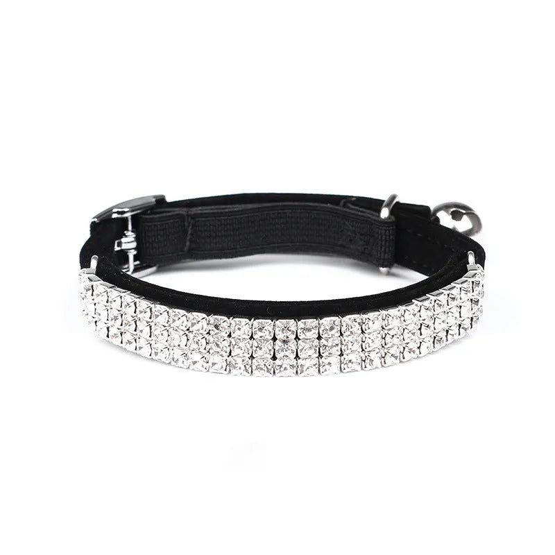 Adjustable red velvet cat collar with a silver rhinestone detail on the buckle.