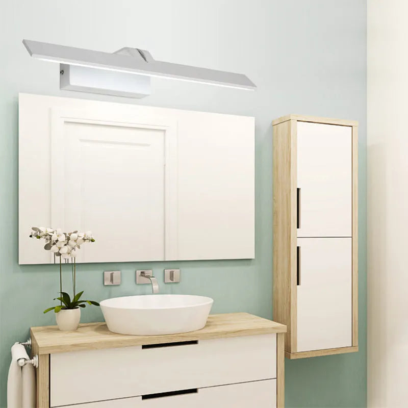 White LED bathroom mirror headlight with tri-colour dimming, shown in 580mm length above a mirror.