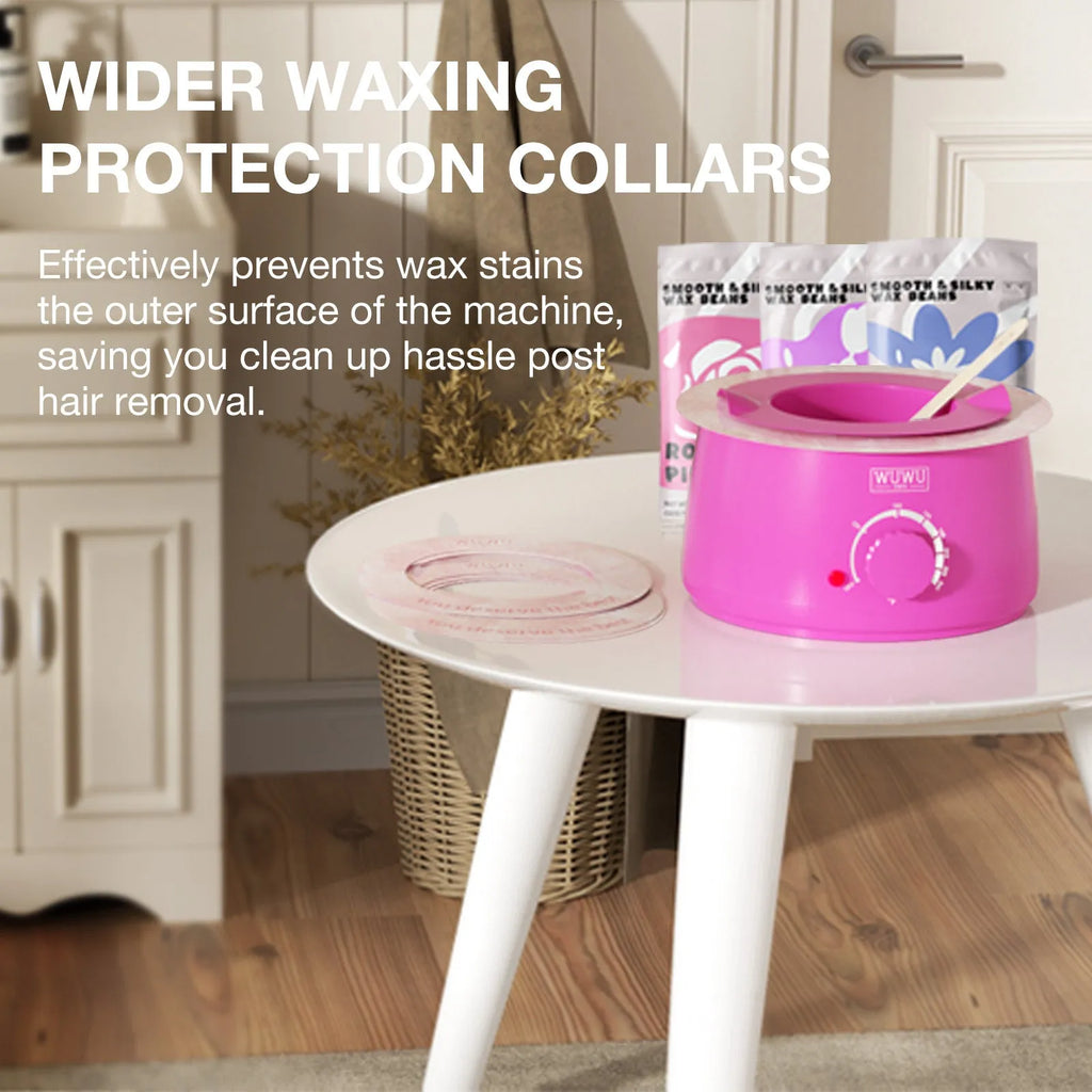 Professional waxing kit with warmer, five jars of hard wax beans, applicator sticks, and aftercare products.