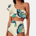 White women's one-shoulder swimsuit bikini with lotus leaf trim and high-leg split.