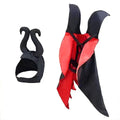Red bat wing cloak and pointed hat Halloween costume set on a small dog.