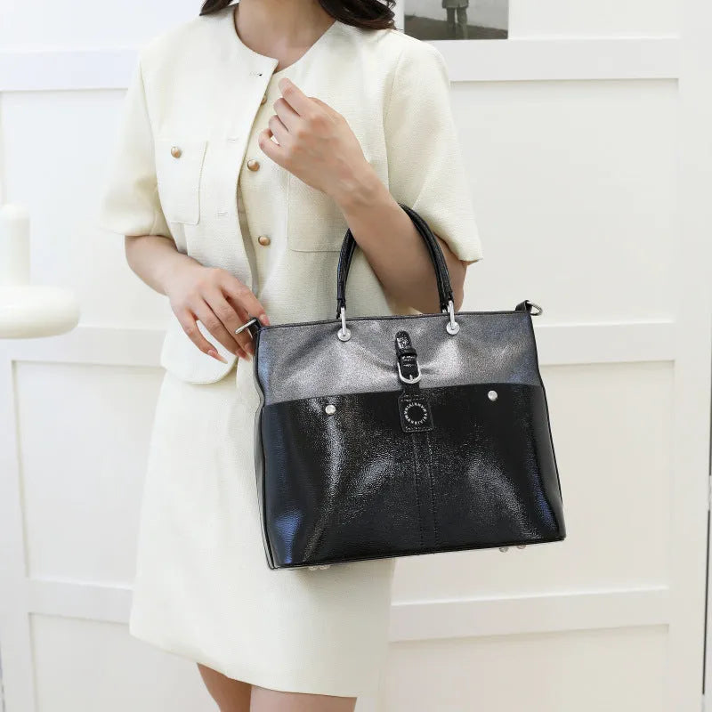 Soft PU shoulder messenger bag in horizontal square shape measuring 33cm by 28cm with sandwich pocket