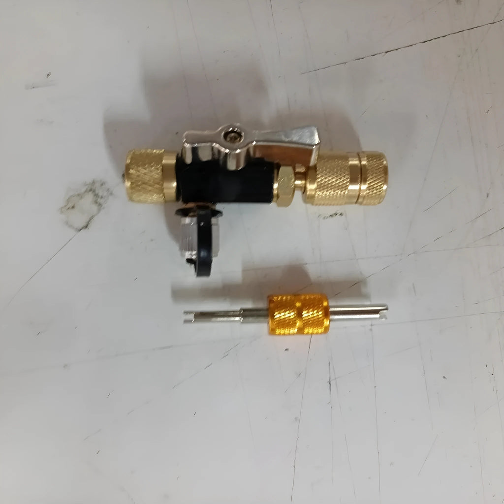 Metal valve core remover tool set showing black and pink tools for 1/4 inch and 5/16 inch vacuum valves.