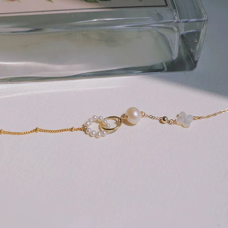 Natural freshwater pearl bracelet for women with gold-plated clasps on metal chain