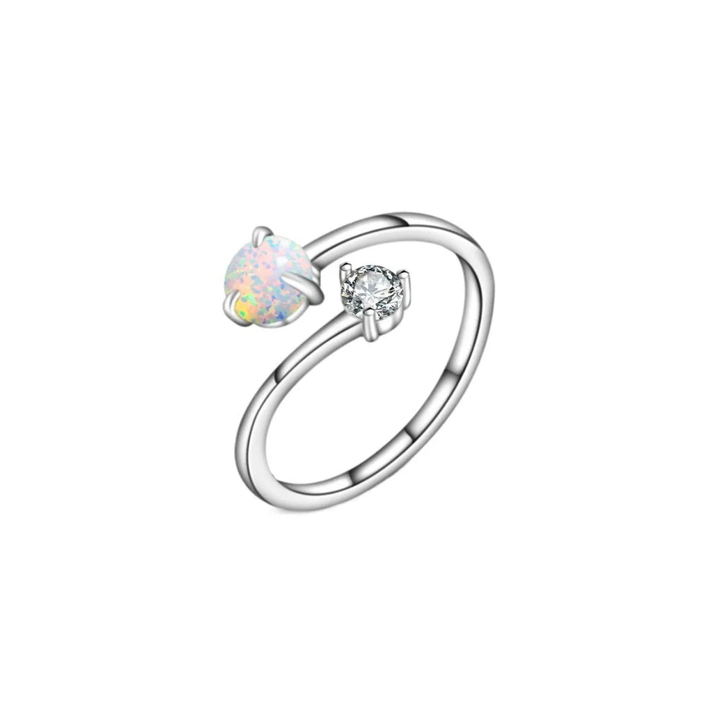 Open ring with adjustable opening, silver band, and inlaid zircon stones in gold colour