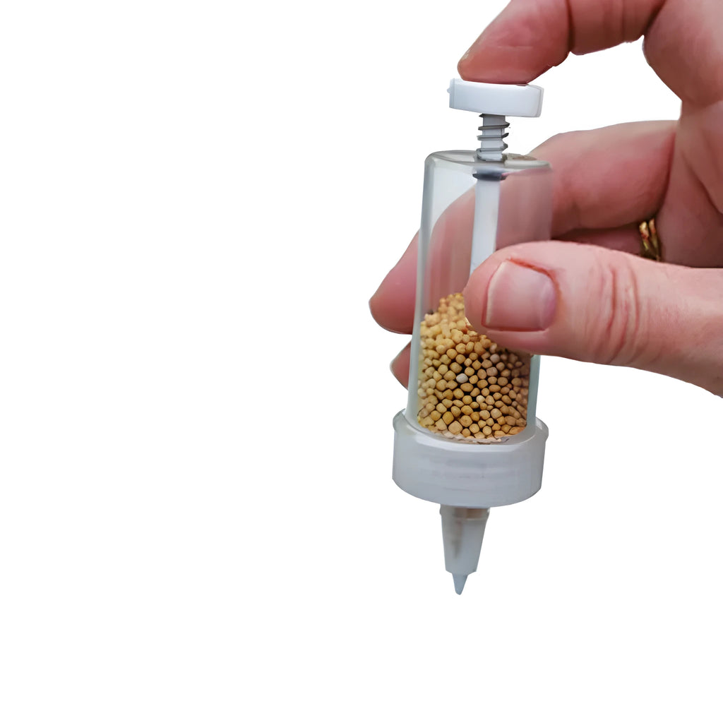 Plastic mini planter tool seeder measuring 12cm length for seed distribution in garden pots