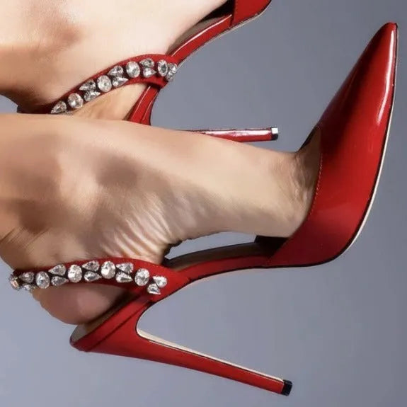 Women's black patent leather pointed toe high heel sandals with rhinestone decoration on the side.