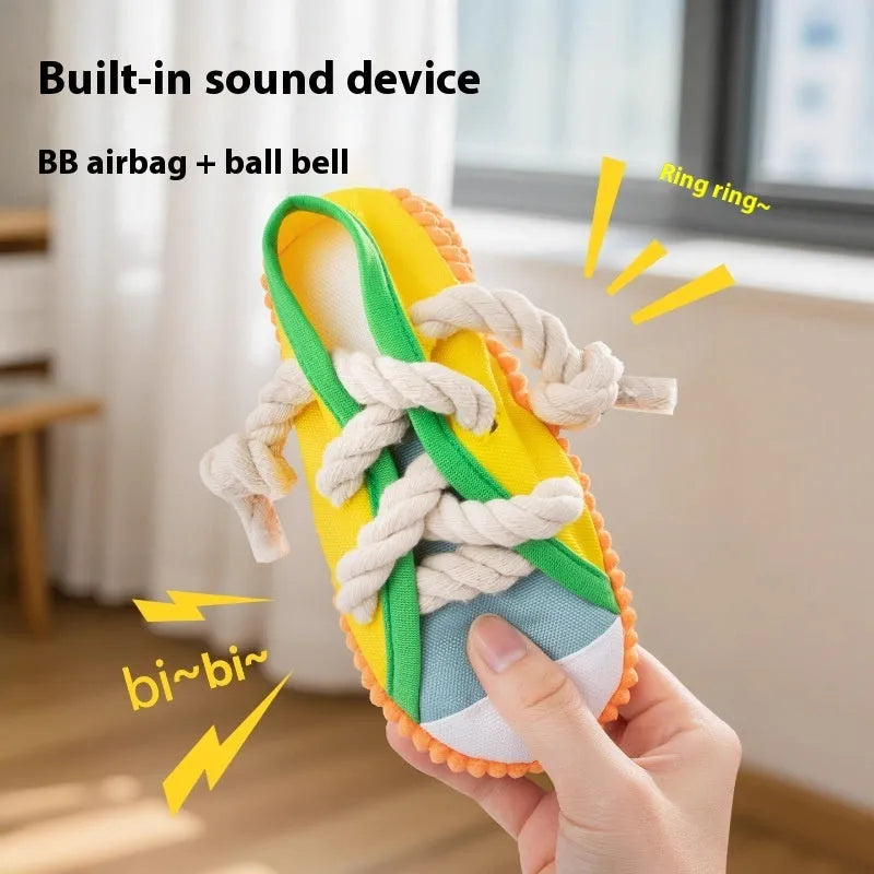 Plastic dog chew toy in yellow, black, or blue colours with a sound-making mechanism.