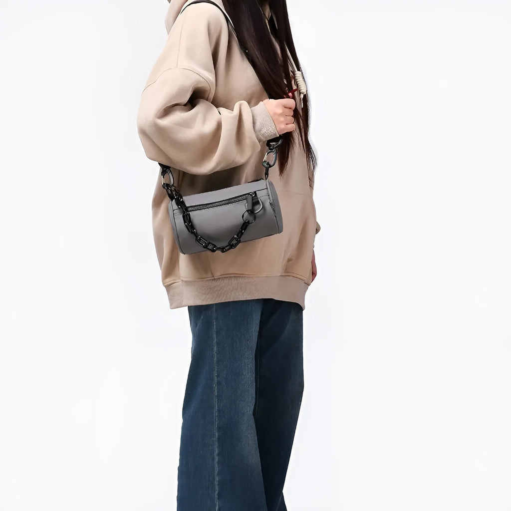 Waterproof Oxford cloth messenger bag with chain detail in urban simplicity style