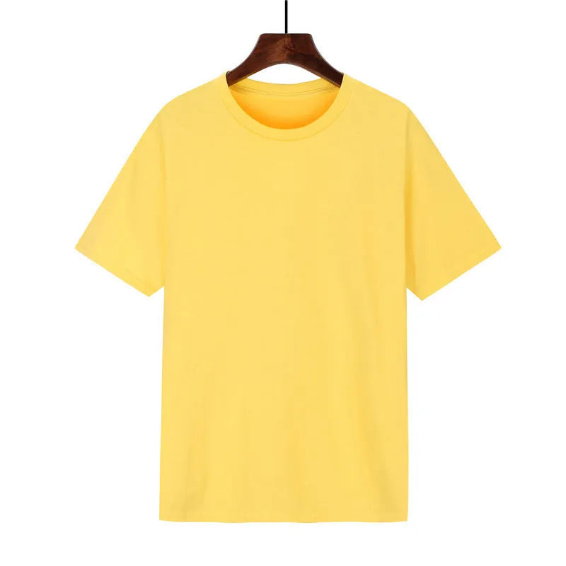 A man's loose-fitting black cotton T-shirt with short sleeves, laid flat.